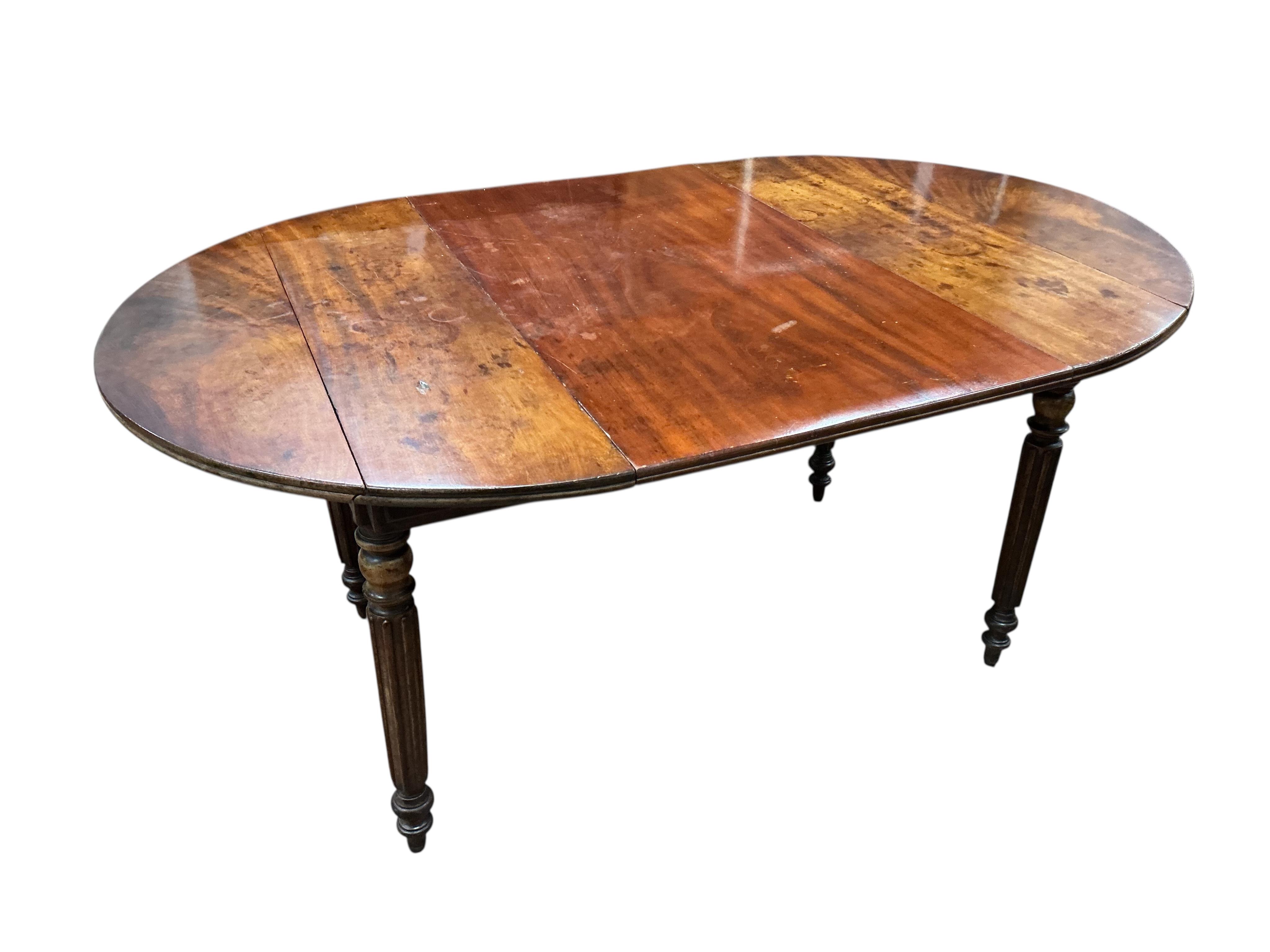 A 19th century French mahogany drop leaf extending dining table, 152cm extended, one spare leaf, depth 96cm, height 66cm